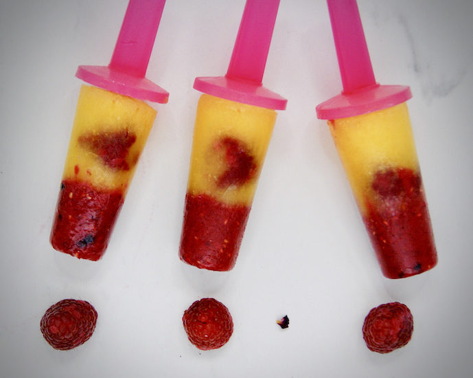 Sucettes glacées à l’orange et aux framboises