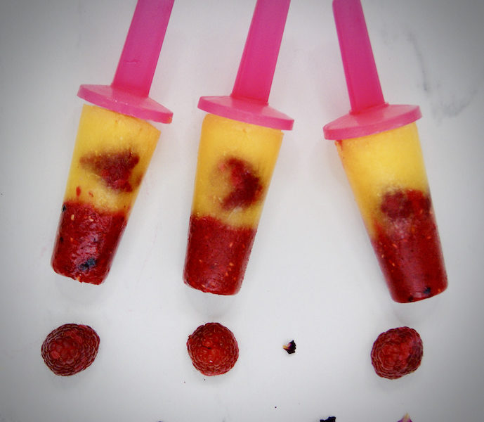 Sucettes glacées à l’orange et aux framboises